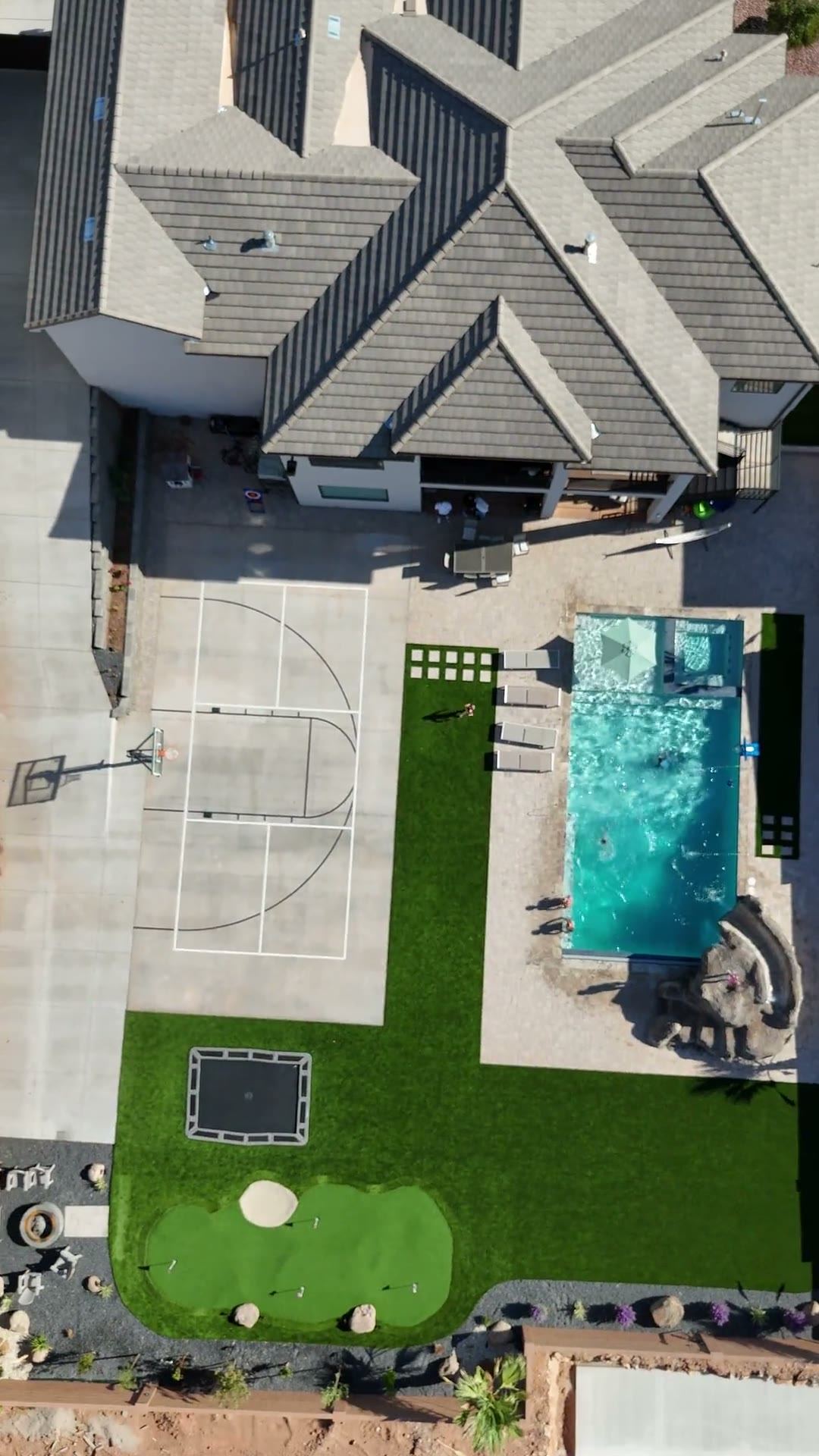 Aerial view of pavers, court and turf